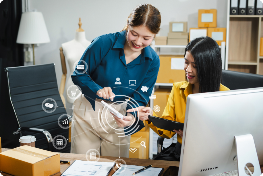 Two women reviewing a performance marketing dashboard